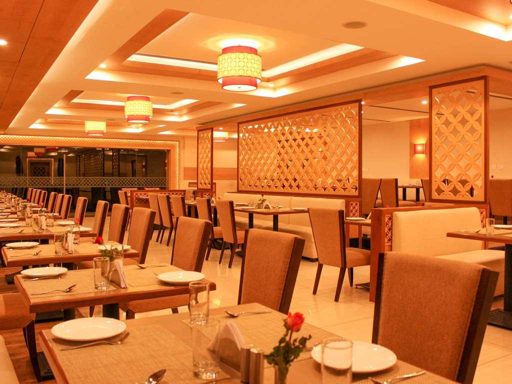 קומבאקונאם Quality Inn Viha מסעדה תמונה